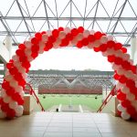 Red and White Spiral Balloon Arch