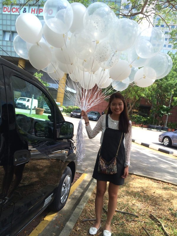 White and clear helium balloons