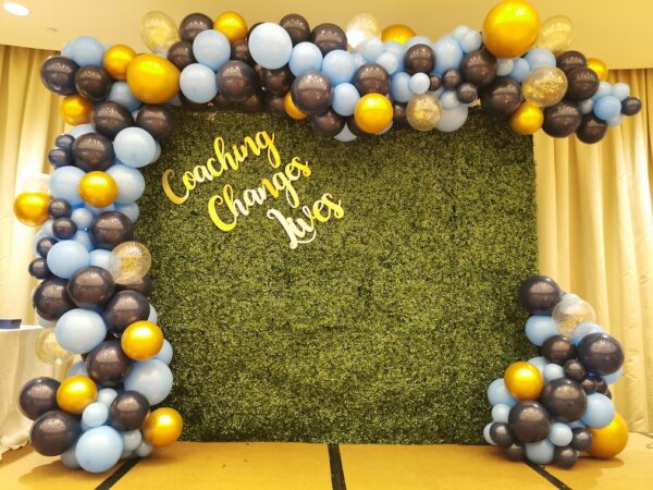 Green Plant Wall backdrop Rental with Organic Balloon Decorations