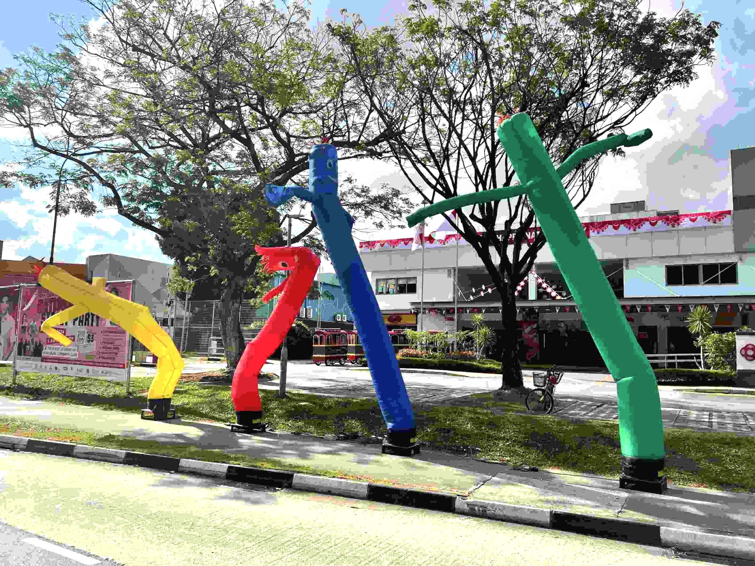 colorful inflatable air dancers outdoor event rental singapore scaled
