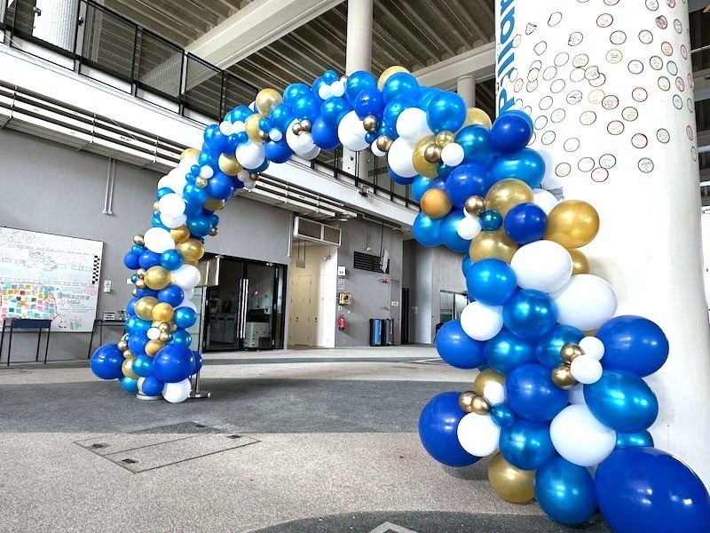 Blue gold white organic arch Balloon Decorations Singapore for corporate event