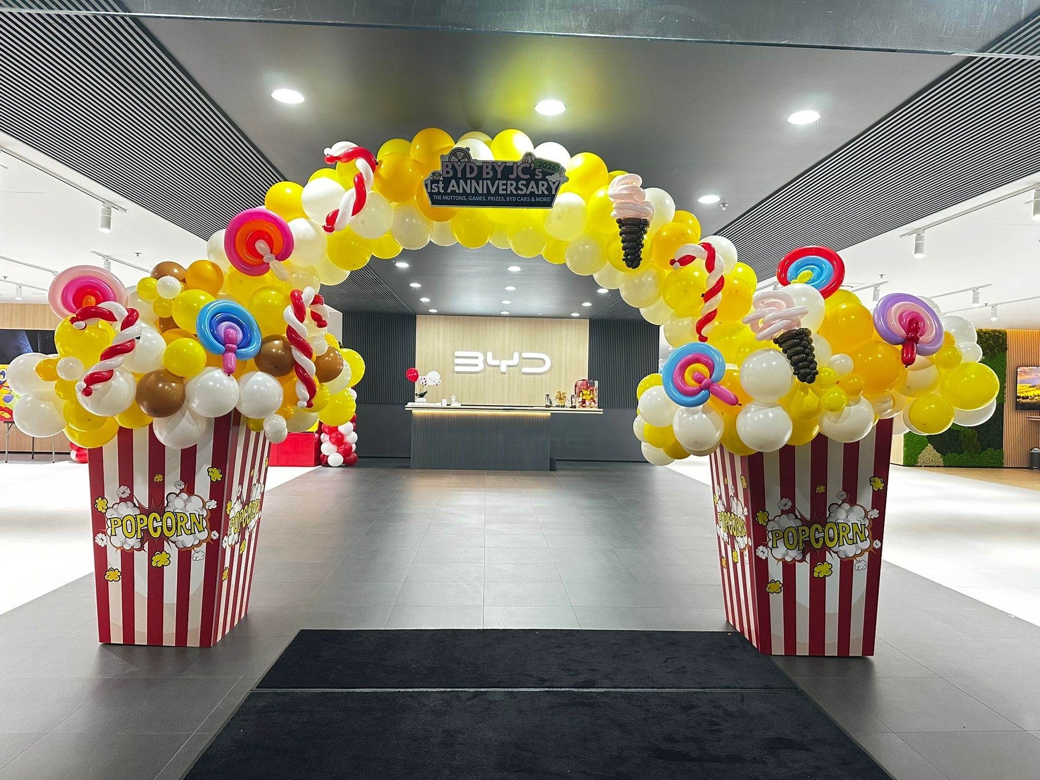 Candy themed organic arch Balloon Decorations Singapore for corporate anniversary