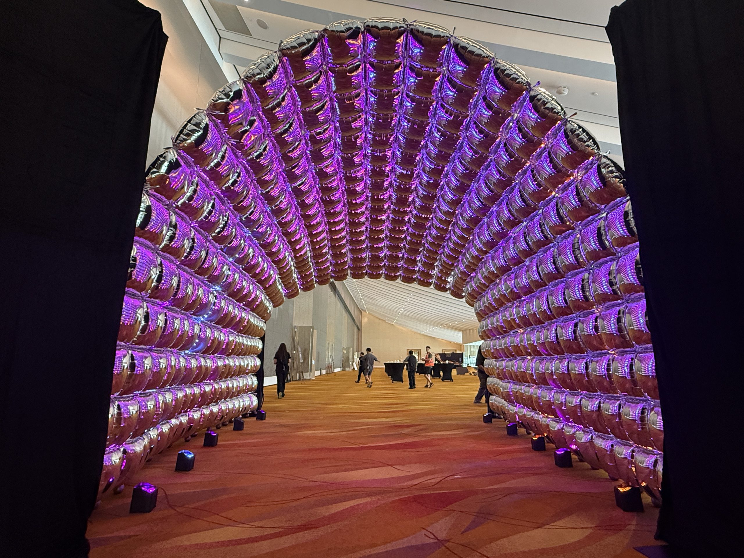 chrome foil balloon tunnel arch purple led uplighting scaled