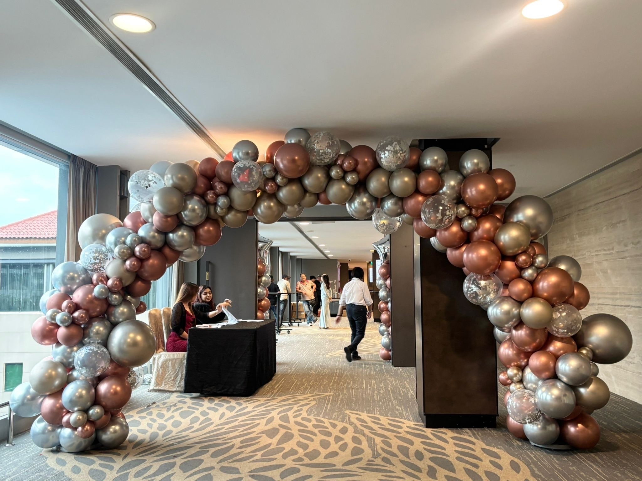 Chrome rose gold organic arch Balloon Decorations Singapore for corporate event