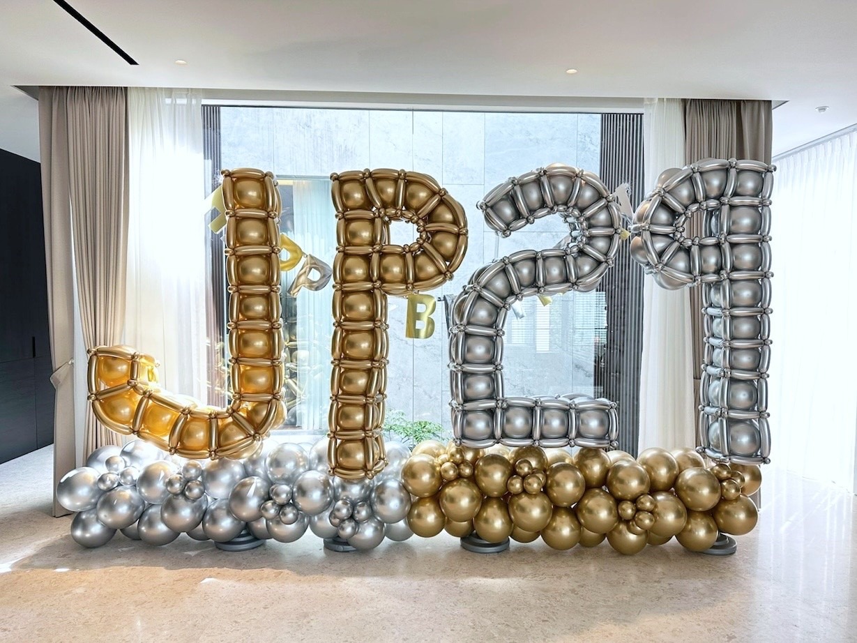 Giant gold and silver balloon letter sculpture for event balloon decorations Singapore