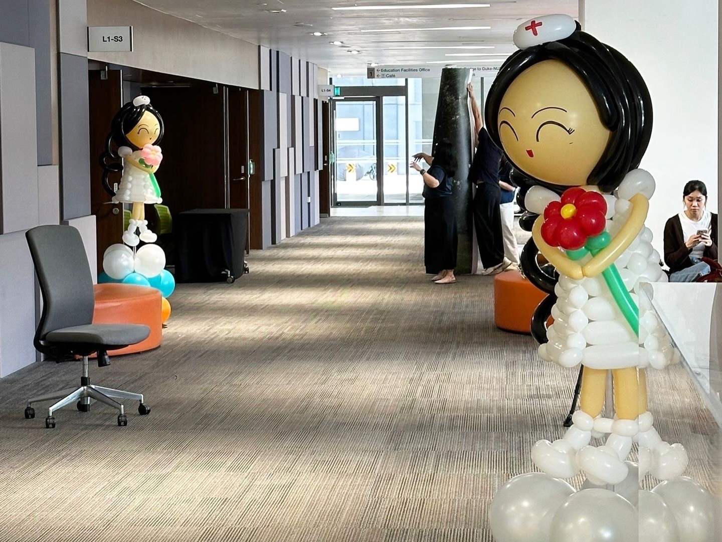 Life-size nurse balloon sculpture for hospital event balloon decorations Singapore