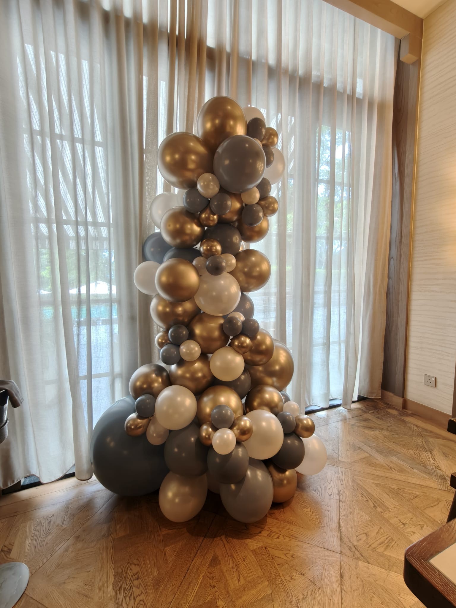 Gold grey white luxury organic column Balloon Decorations Singapore for upscale event