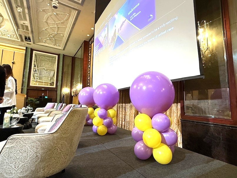 Purple and yellow balloon columns ballroom corporate balloon decorations Singapore