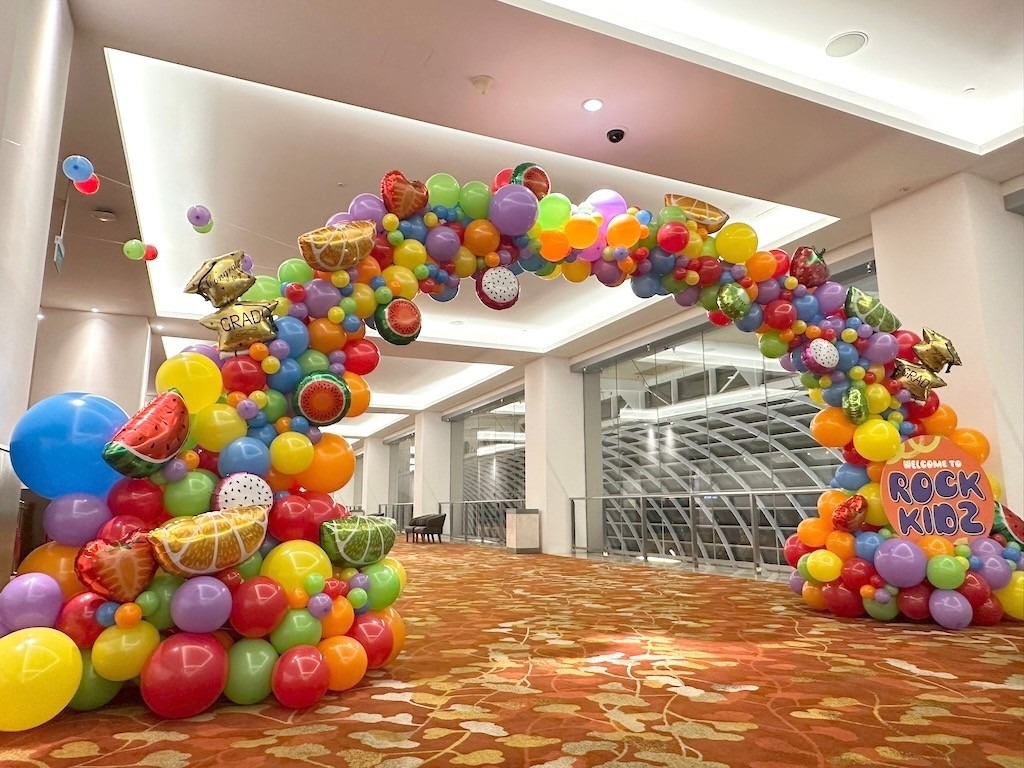 Fruit-themed organic balloon arch for kids event balloon decorations Singapore