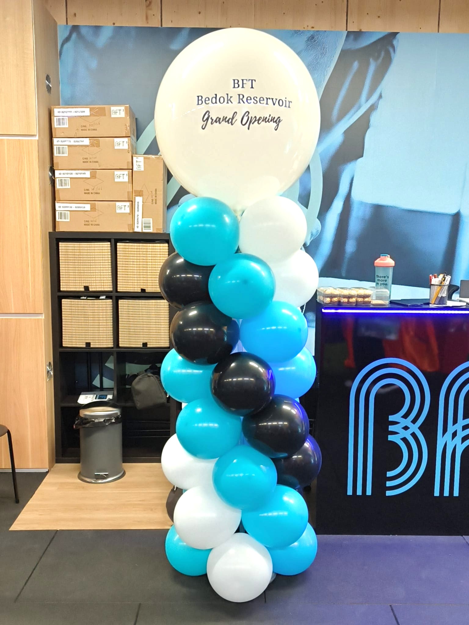 Corporate grand opening balloon column setup by balloon shop Singapore