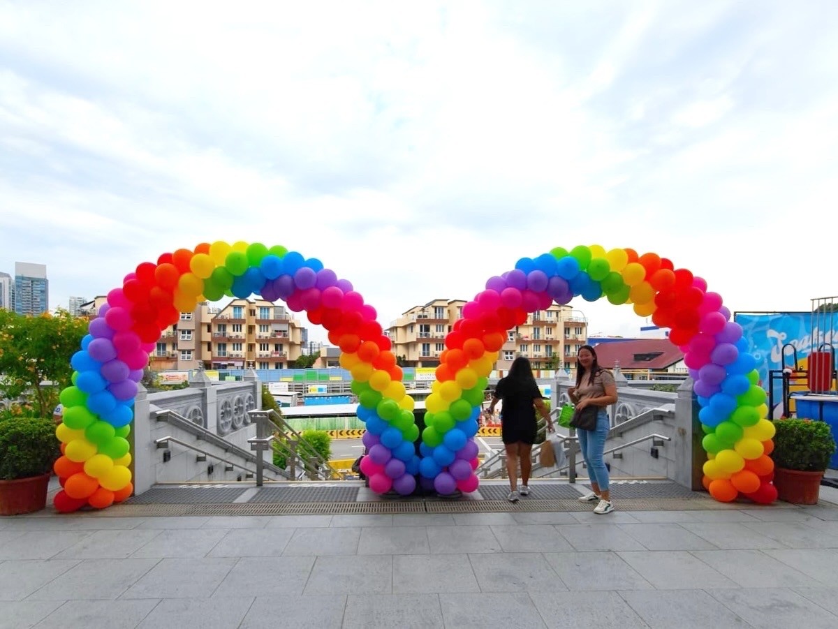Balloon Decorations Singapore: Hidden Costs Breakdown & Price Transparency Guide 11 Rainbow heart balloon arch for outdoor event balloon decorations Singapore