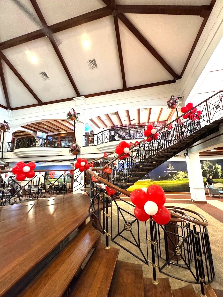 Red and white balloon flower staircase balloon decorations Singapore for National Day