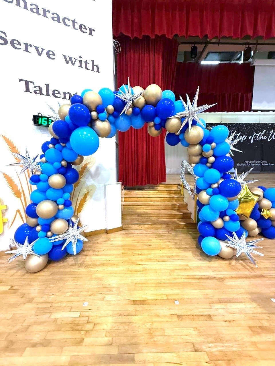 Blue and gold organic balloon arch for school event balloon decorations Singapore