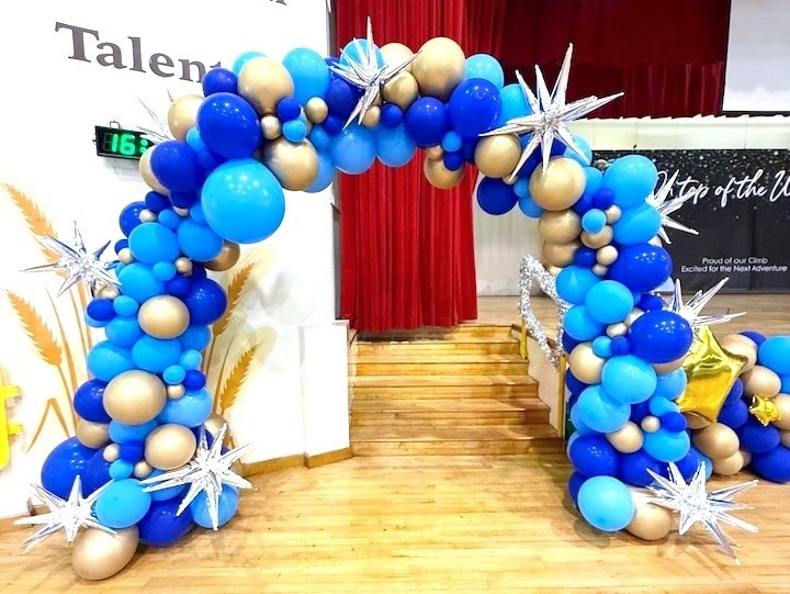 Blue and gold organic balloon arch stage decoration Singapore