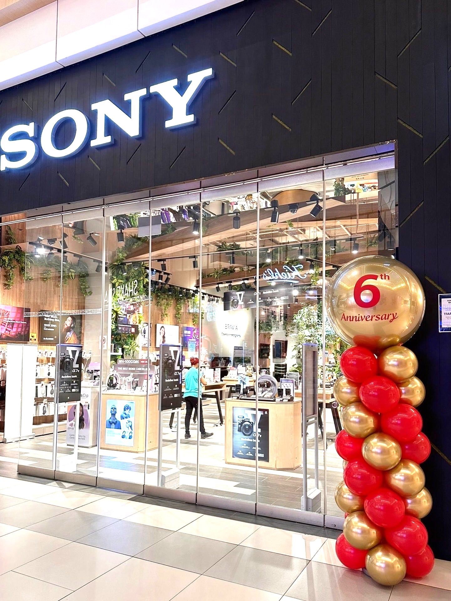 Red and gold balloon column store anniversary balloon decorations Singapore