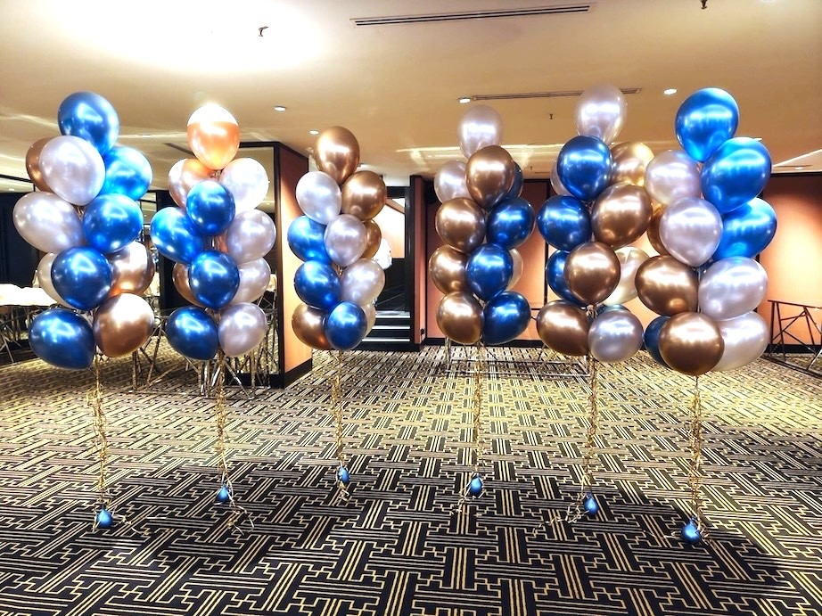 Chrome helium balloon clusters at corporate ballroom event Singapore