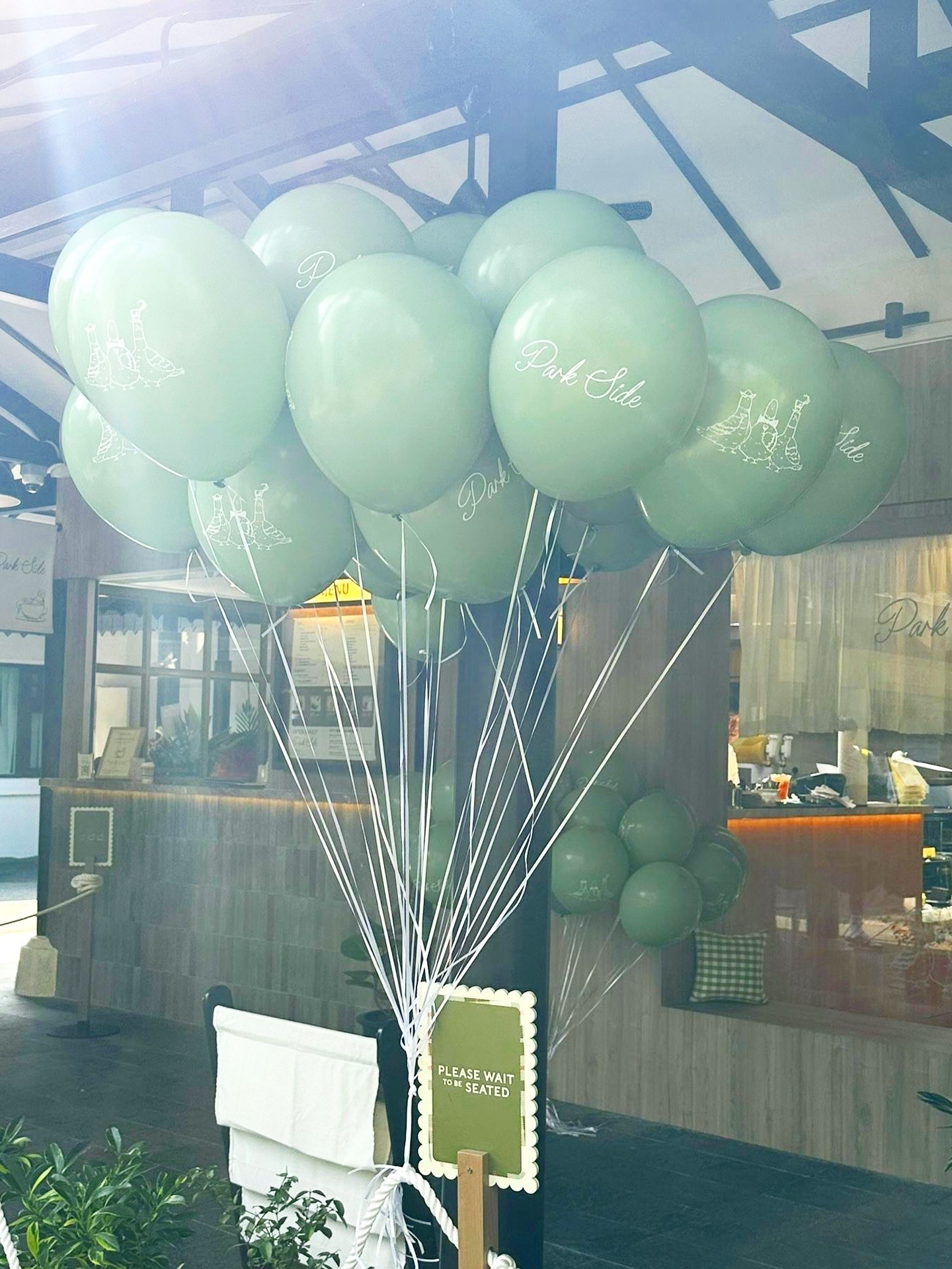 Custom printed helium balloons for restaurant branding Singapore