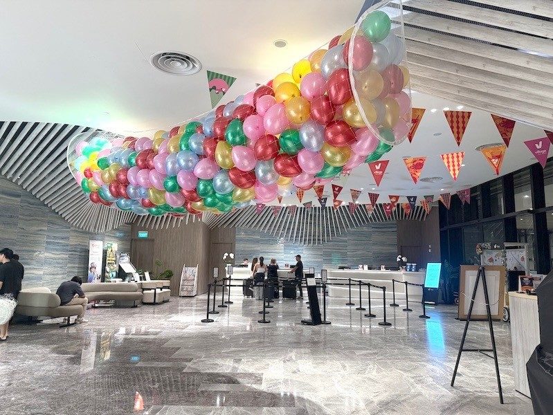 Balloon drop net ceiling installation lobby event Singapore