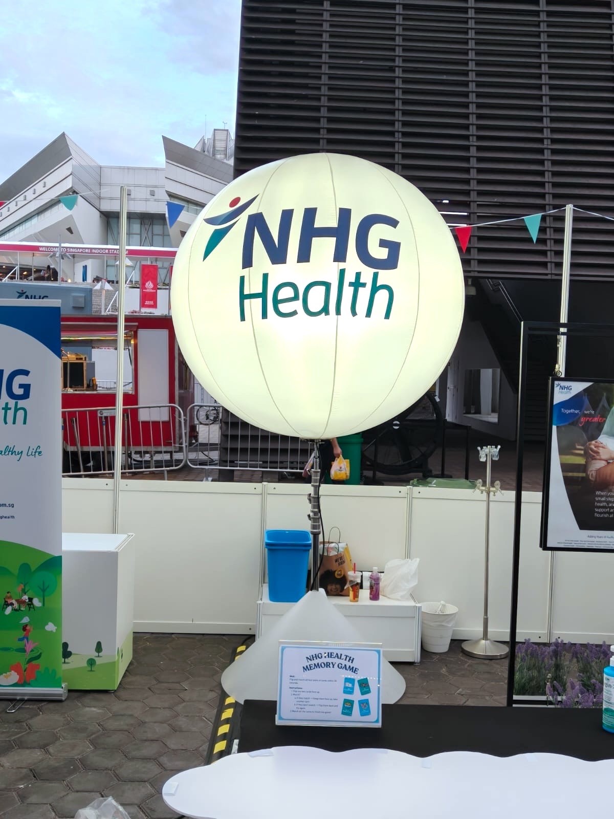 The Most Popular Advertising Balloon Singapore Looks Trending at Events in 2026 8 Branded NHG Health advertising balloon at corporate event in Singapore