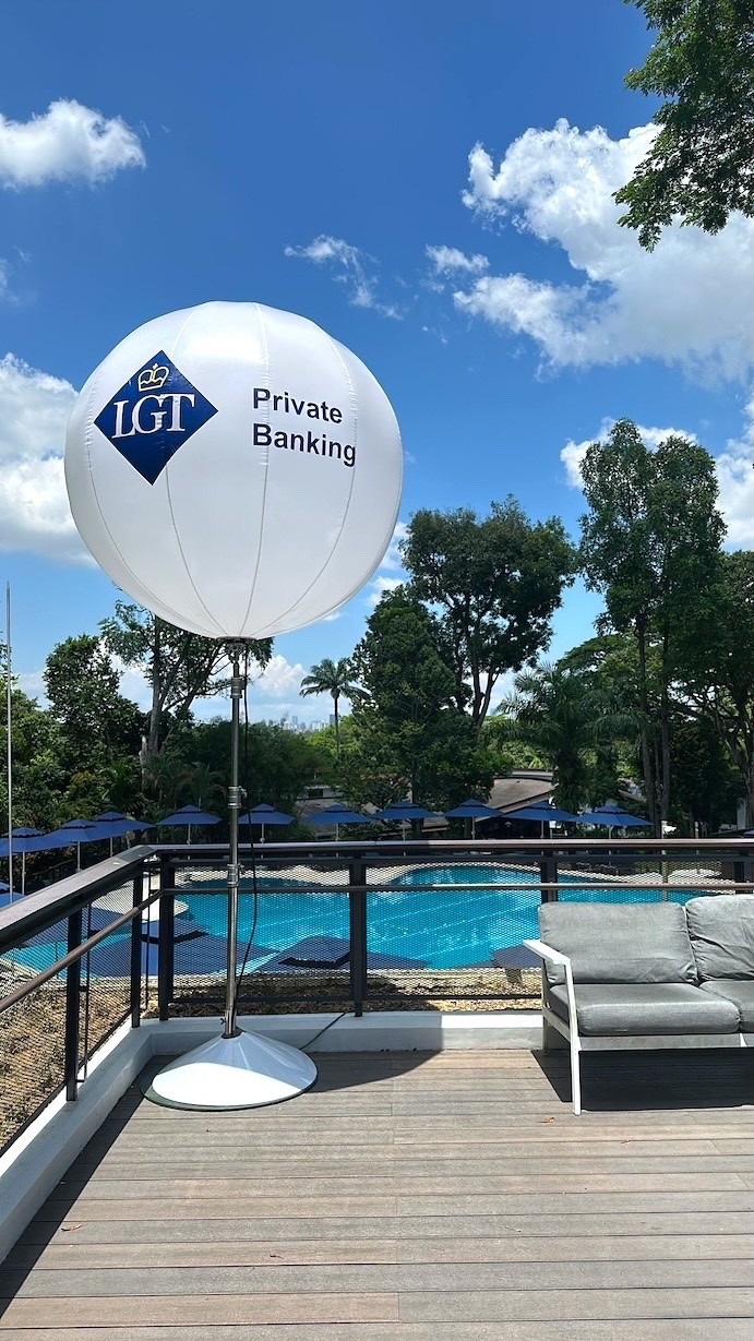 The Most Popular Advertising Balloon Singapore Looks Trending at Events in 2026 4 Branded advertising balloon on stand at poolside corporate event Singapore