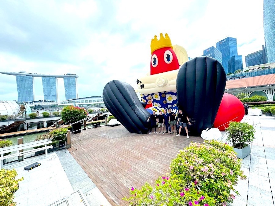 Giant custom inflatable character installation at Marina Bay for a corporate activation in Singapore