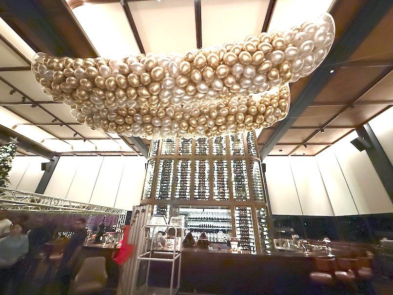Gold chrome balloon cloud ceiling installation corporate event Singapore