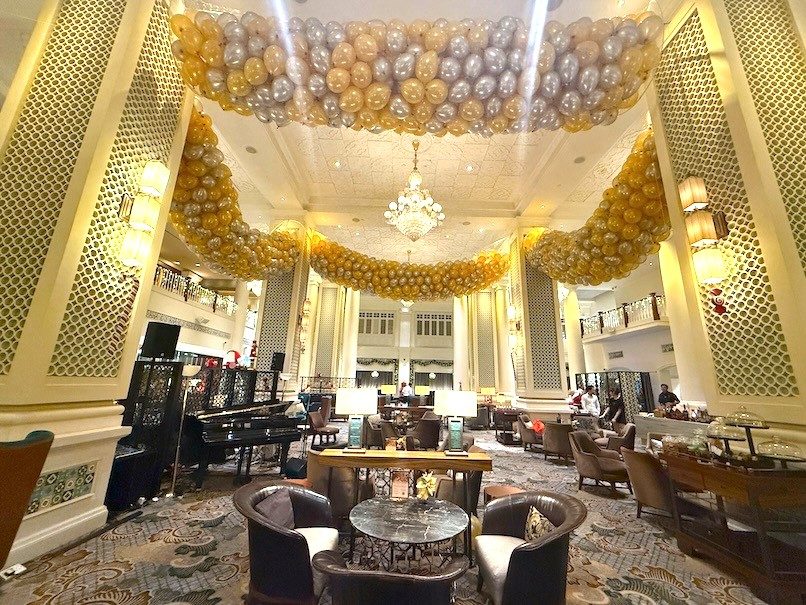 Grand hotel lobby organic balloon ceiling installation Singapore