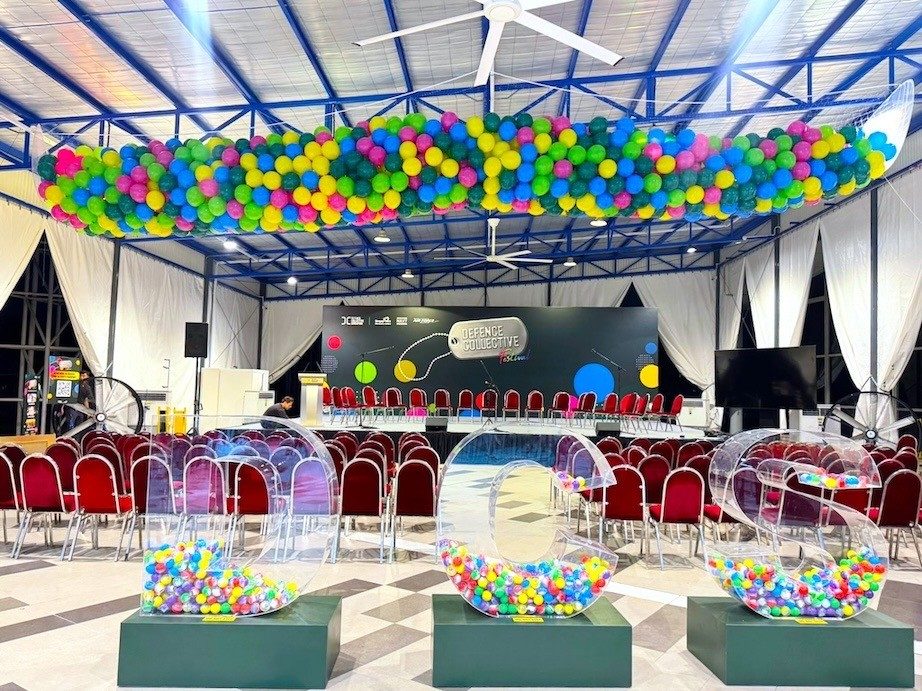 Large balloon ceiling installation stage decoration corporate event Singapore