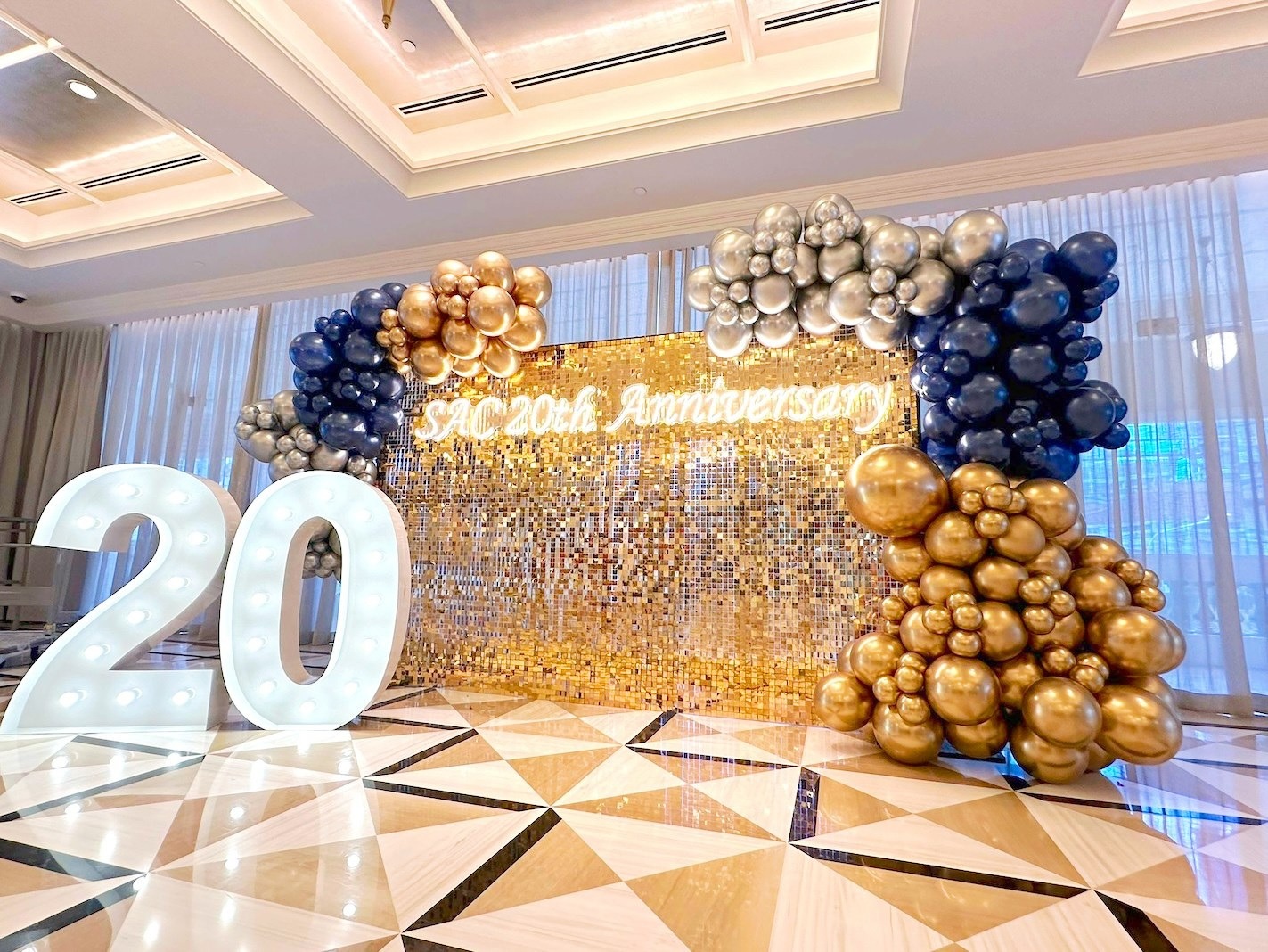 Blue gold and silver anniversary photo backdrop